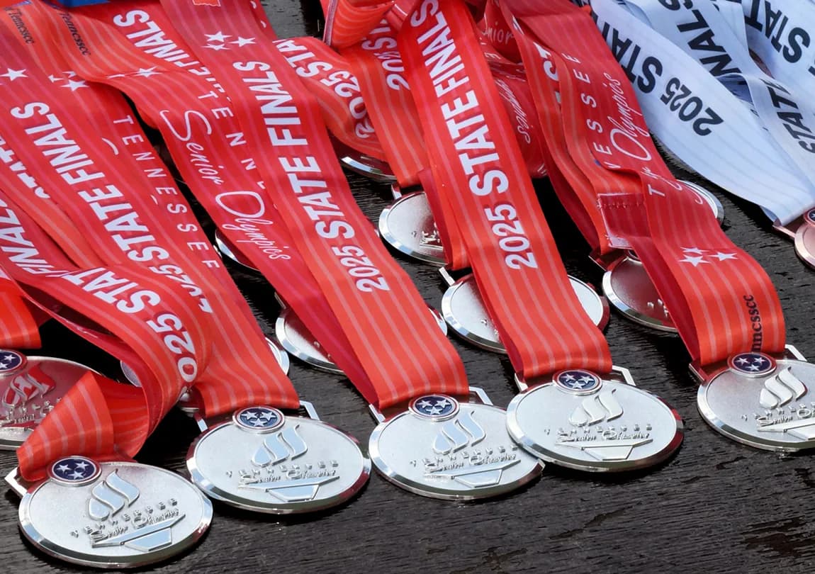 A table full of medals waiting to be won.
